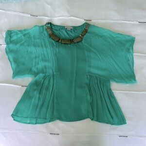 Turquoise pullover blouse with beaded neck, loose fit.